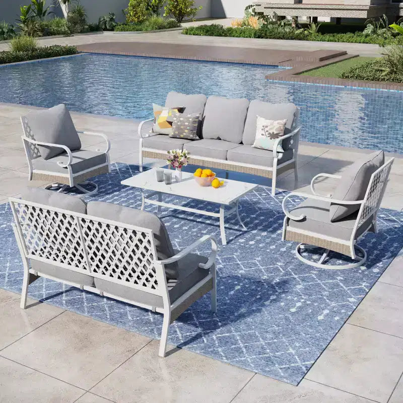 Ensemble convivial d’extérieur Captiva Designs, 5 pièces extra-large, en métal et rotin, avec fauteuils pivotants à dossier quadrillé et canapé 2 places