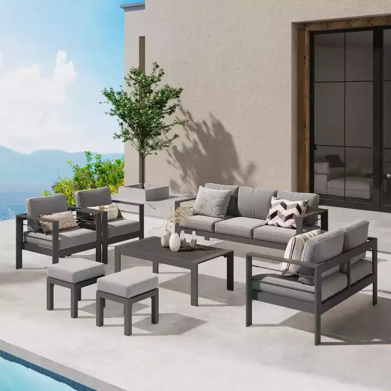 Conjunto de muebles de aluminio para patio exterior Heynemo con reposapiés, sofá seccional metálico para exterior con cojín de 5'' y mesa de centro para balcón o jardín