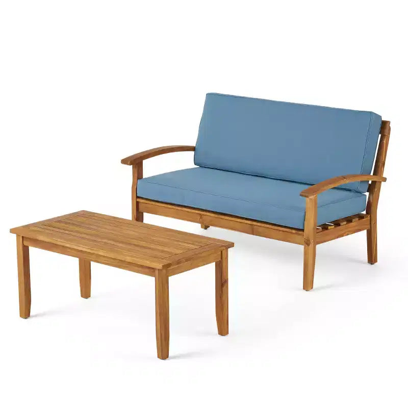 Conjunto GDFStudio Keanu de sofá biplaza y mesa de centro de madera de acacia para exteriores, con cojines