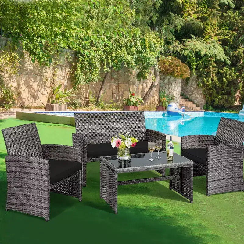 Set di mobili da patio Costway da 4 pezzi in rattan, per conversazione, con piano del tavolo in vetro e imbottitura, Turchese/Rosso/Grigio/Beige/Blu navy/Nero