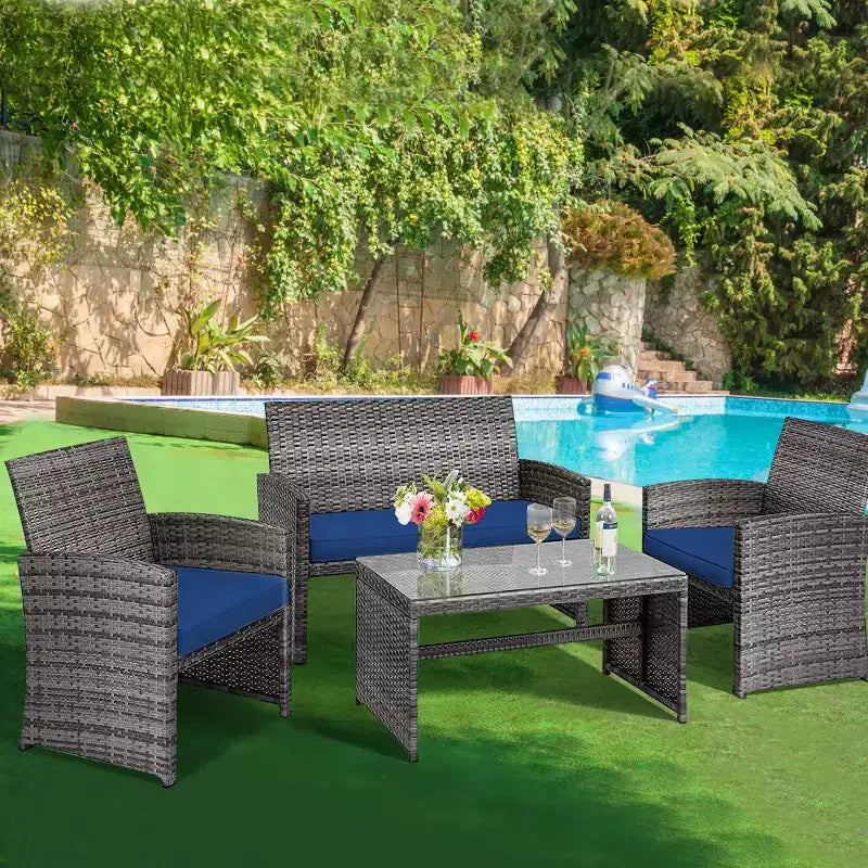 Set di mobili da patio Costway da 4 pezzi in rattan, per conversazione, con piano del tavolo in vetro e imbottitura, Turchese/Rosso/Grigio/Beige/Blu navy/Nero