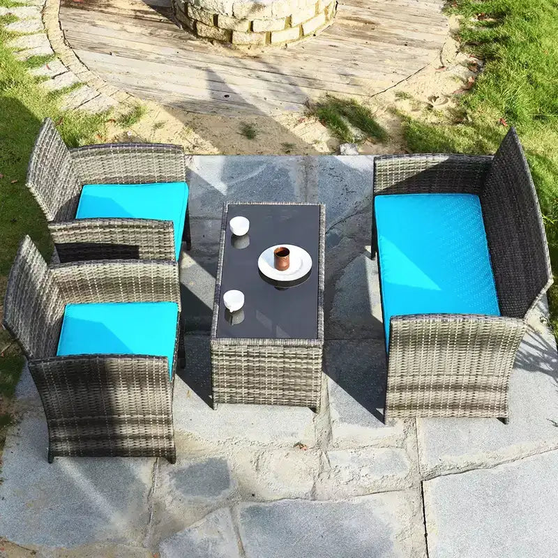 Set di mobili da patio Costway da 4 pezzi in rattan, per conversazione, con piano del tavolo in vetro e imbottitura, Turchese/Rosso/Grigio/Beige/Blu navy/Nero