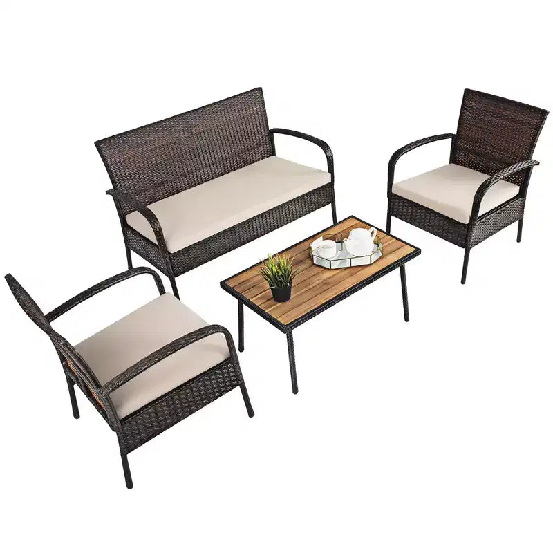 Ensemble de mobilier de patio en rotin Costway 4 pièces, salon de jardin avec table basse et coussins