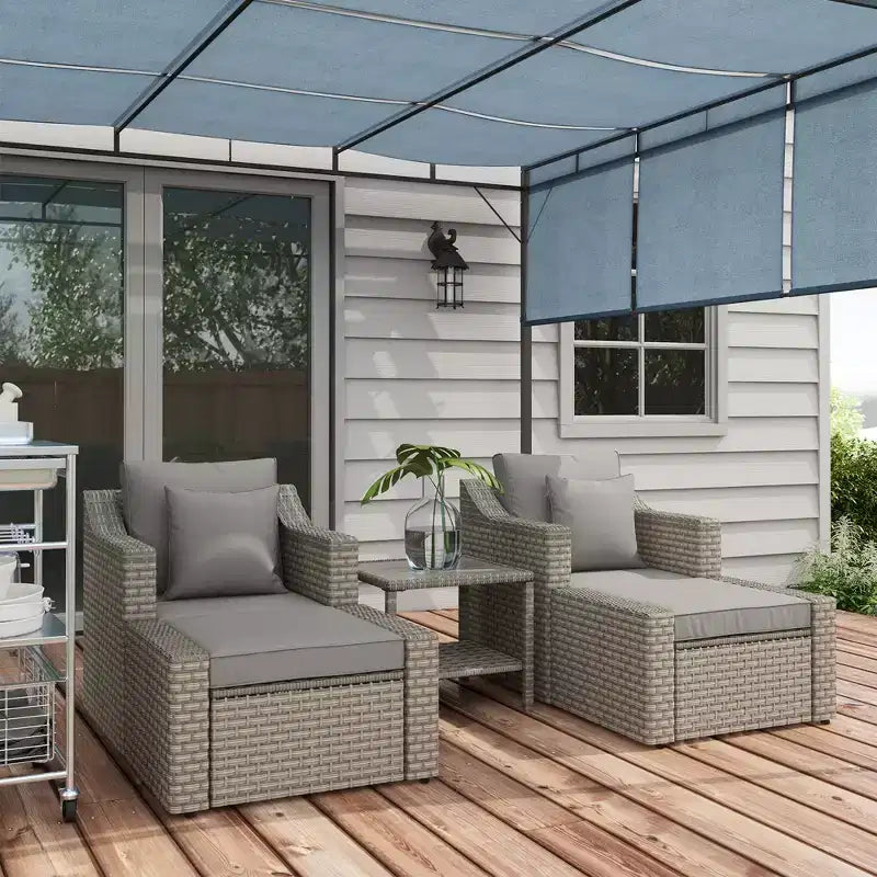 Ensemble de mobilier de terrasse Outsunny de 5 pièces, ensemble de fauteuils de conversation et pouf en rotin PE toutes saisons, avec table, coussins et oreillers inclus