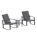 Ensemble de jardin Emma and Oliver 3 pièces avec fauteuils à bascule d’extérieur en matériau Flex Comfort et table à plateau en verre à structure métallique